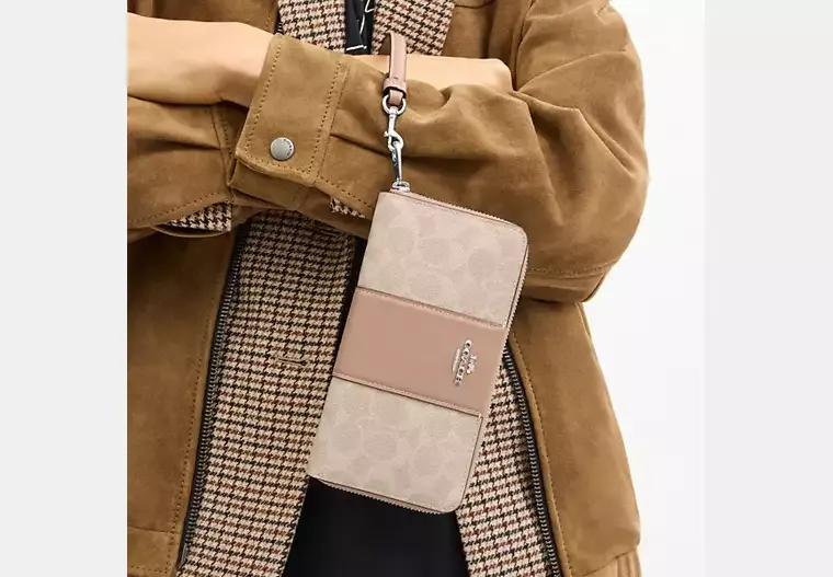 C.O.A.C.H Long Zip Around Wallet In Signature Canvas With Stripe