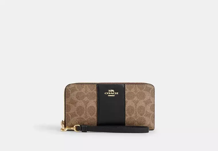 C.O.A.C.H Long Zip Around Wallet In Signature Canvas With Stripe