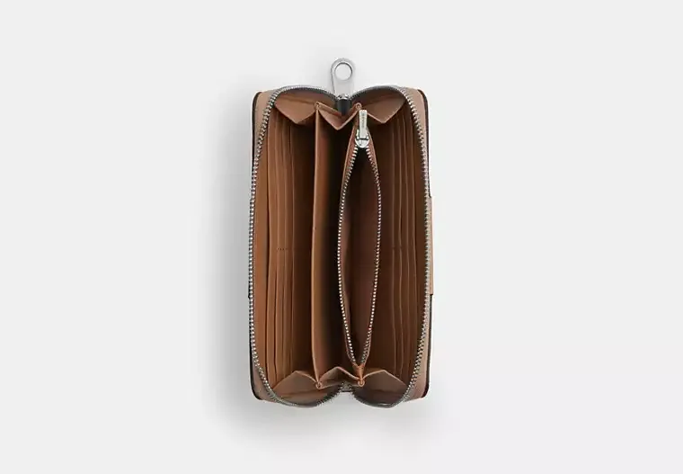 C.O.A.C.H Long Zip Around Wallet In Signature Canvas With Stripe