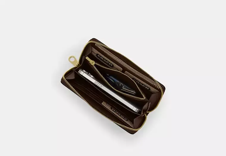 C.O.A.C.H Long Zip Around Wallet In Signature Canvas With Stripe