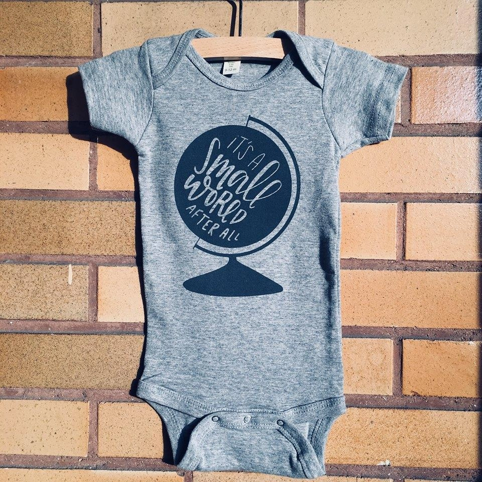 Treetops Collective It's a Small World Baby Bodysuit